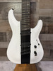 Schecter C-7 Contrasts Rob Scallon 7-String Multiscale guitar featuring a dual white/black finish, multi-scale ebony fingerboard, signature pickups, lightweight body, and signature Rob Scallon design elements.