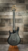 Flaxwood Rautia Electric Guitar in Glossy Black finish with gold hardware – used model showing single-cut body design and handcrafted Finnish build quality