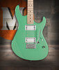 Cort G250SMEG Spectrum Double Cutaway Electric Guitar in Metallic Green finish with roasted maple neck and HSS pickups.