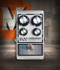 Digitech DOD-GUNSLINGER Mosfet Distortion Pedal featuring rugged silver housing, dual-level controls, and warm tube-like distortion perfect for modern rock and metal tones.