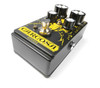 Digitech DOD-CARCOSA Carcosa Analog Fuzz Pedal featuring sleek black and gold design, dual level controls, and switchable modes for classic and modern fuzz textures.