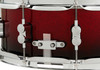 PDP Concept Maple 5.5x14 Snare Drum in Red to Black Fade Lacquer finish with maple shell and chrome hardware, blending modern style with warm tone.