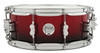 PDP Concept Maple 5.5x14 Snare Drum in Red to Black Fade Lacquer finish with maple shell and chrome hardware, blending modern style with warm tone.