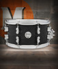PDP Concept Series 7x13 Black Wax Maple Snare Drum in Satin Black finish with chrome hardware, delivering full maple tone, fast response, and modern style.
