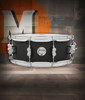 PDP Concept Series 5.5x14 Black Wax Maple Snare Drum in Satin Black finish with chrome hardware, offering warm maple tone, bright attack, and modern look.