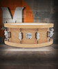 PDP Concept 20-Ply 5.5x14 Snare Drum in Natural Maple finish with thick wood hoops and maple shell, delivering warm tone and exceptional projection.