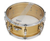 PDP Concept Series 6.5x14 Snare Drum in Natural Satin Brushed Brass with 1.2mm shell and chrome hardware, producing warm tone, lively projection, and classic look.