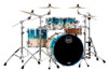Mapex Saturn Rock 4-Piece Shell Pack in Aqua Fade featuring hybrid maple-walnut shells, SONIClear bearing edges, and robust hardware designed for powerful rock performance.