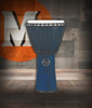 Latin Percussion LP724B World Beat FX 11" Rope-Tuned Synthetic Djembe featuring a lightweight synthetic shell, durable rope tuning system, vibrant blue finish, and resonant tone ideal for world percussion, classrooms, and recreational drumming.