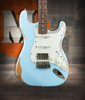 Vintage V6 ICON Electric Guitar in Distressed Laguna Blue featuring a relic-style finish, Wilkinson hardware and pickups, contoured body, smooth neck profile, and classic vintage-influenced tonal character.