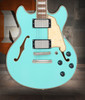 Dâ€™Angelico Premier Mini DC - Surf Green (DAPMDCSGRNS) featuring a compact semi-hollow double-cut design, stop-bar tailpiece, dual humbuckers, and a rich warm, versatile tone.