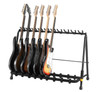 Hercules GS525B 5-Piece Guitar Rack Stand featuring padded supports, a durable foldable frame, and capacity for five acoustic, electric, or bass guitars.