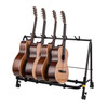Hercules GS525BPLUS 5-Piece Guitar Rack Stand with Casters featuring padded supports, foldable durable frame, and rolling casters for easy transport of up to five guitars.