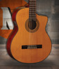 Shop the Washburn C64SCE Classical Cutaway Acoustic Guitar in Natural (C64SCE-A-U) at Musician Madness. Warm nylon-string tone with stage-ready cutaway design.