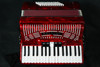 The Hohner Hohnica 1305 72-Bass Pearl Red Accordion offers rich tone, smooth playability, and Hohner qualityÃ¢â‚¬â€perfect for students and hobbyists. Shop now!