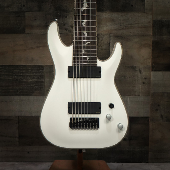 Unleash the Power of Nine: Introducing the Schecter White Damien Platinum 9-String Electric Guitar Exclusive Run for Musician Madness Only! 