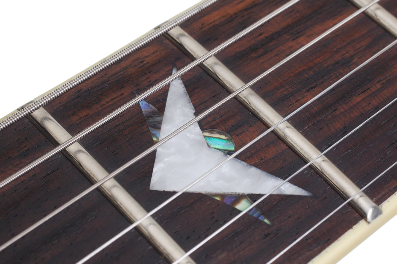 Schecter Omen Extreme-6 String Electric Guitar with quilted maple top, dual humbuckers, and contoured body design in gloss finish.