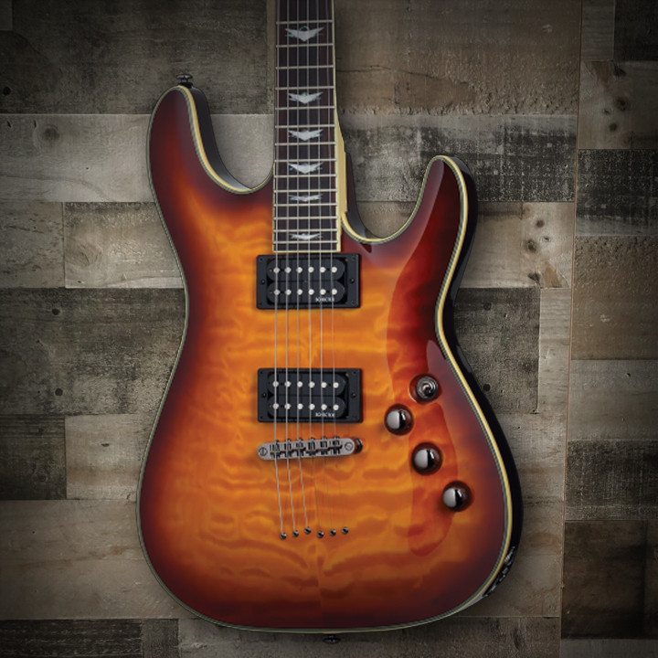 Schecter Omen Extreme-6 String Electric Guitar with quilted maple top, dual humbuckers, and contoured body design in gloss finish.