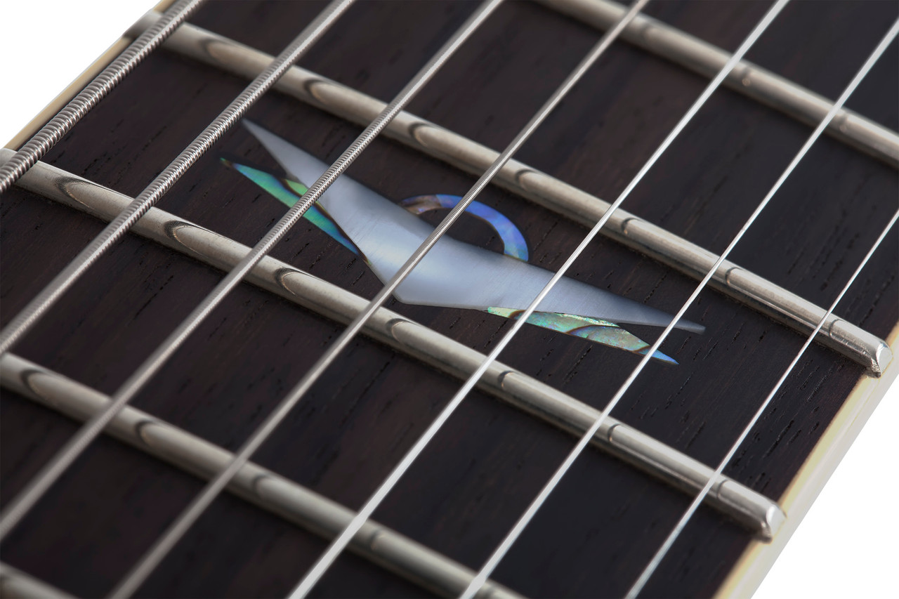 The Schecter Omen Extreme-7 String Electric Guitar (Item #2008) features a stunning Black Cherry quilted maple top over a mahogany body, delivering rich resonance and aggressive bite. Its thin-C maple neck and rosewood fingerboard provide fast, comfortable playability, while Schecter Diamond Plus humbuckers deliver high-output tone suited for metal, rock, and modern extended-range styles. Additional features include black chrome hardware, Tune-O-Matic bridge, and sleek multi-ply binding.