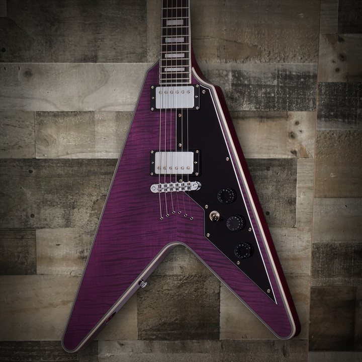 Schecter V-1 Custom Electric Guitar in Trans Purple finish with Flying V body, dual Seymour Duncan humbuckers, and chrome hardware.