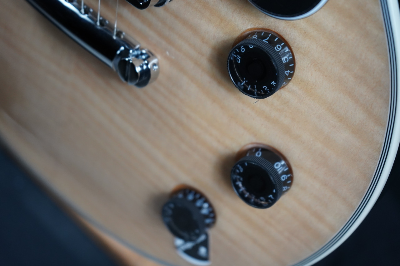 Schecter Solo-II Custom Electric Guitar in Gloss Natural finish with single-cut body, dual humbuckers, and chrome hardware.