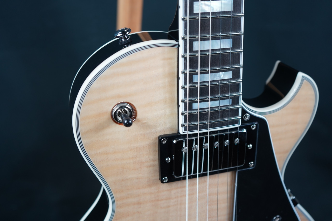 Schecter Solo-II Custom Electric Guitar in Gloss Natural finish with single-cut body, dual humbuckers, and chrome hardware.