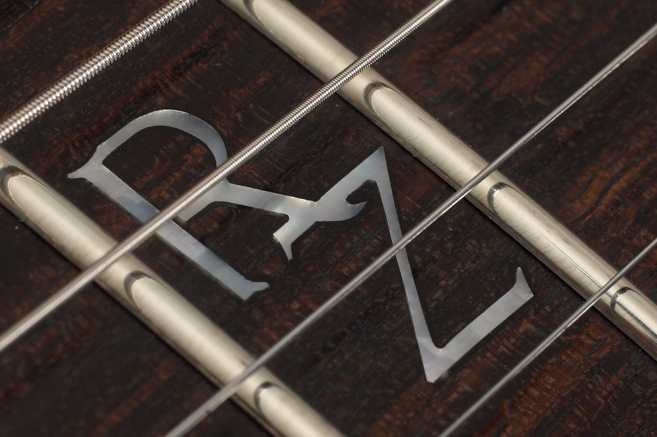 Schecter Robin Zander Signature Corsair Electric Guitar with semi-hollow body, Bigsby tremolo, and Schecter Diamond pickups in gloss finish.