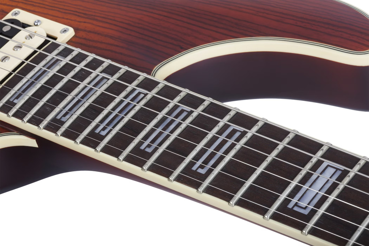 Schecter C-1 E/A Electric Guitar in Ca-s Eye finish with semi-hollow body design, dual pickups, and chrome hardware.