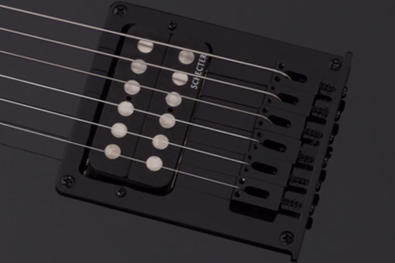 The Schecter PT-M/M Left-Handed Electric Guitar (2200-SHC) features a classic T-style body finished in high-gloss black, complemented by a fast, comfortable maple neck and maple fingerboard. Diamond Series pickups deliver crisp articulation, tight lows, and rich mids suitable for rock, blues, country, and modern styles. A reliable, stage-ready option for left-handed players wanting professional performance.