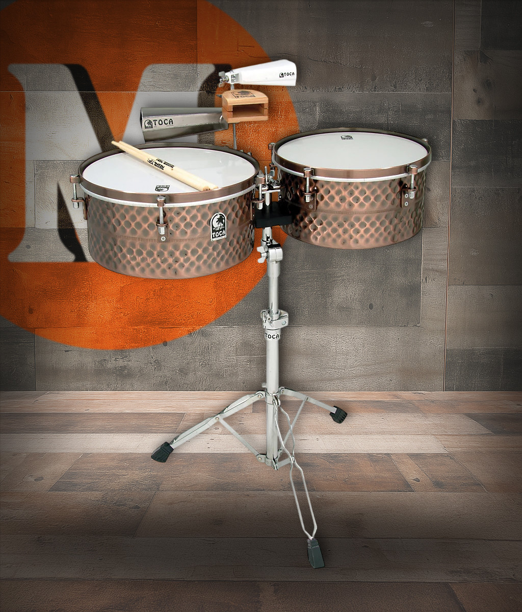 Toca Pro Line Timbales 14"/15" - Black Chrome (TPT1415-BC) featuring black chrome shells, bright cutting tone, heavy-duty tuning hardware, and an included double-braced timbale stand.