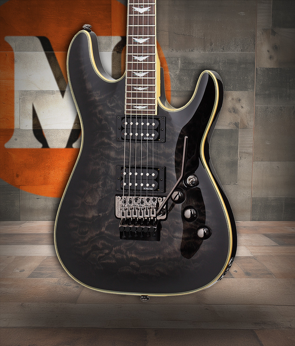 Schecter Omen Extreme FR Electric Guitar - See-Thru Black finish with quilted maple top, Floyd Rose tremolo, and dual humbuckers delivering aggressive tone and smooth playability