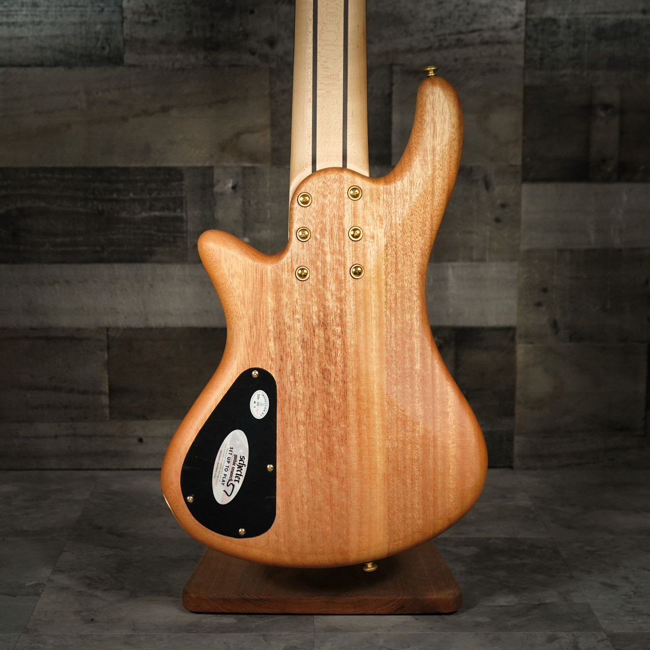 Schecter Stiletto Custom-6 Bass Guitar – Natural Satin (NAT) finish featuring 6-string design, EMG pickups, active 3-band EQ, and contoured mahogany body for smooth, powerful tone and modern versatility