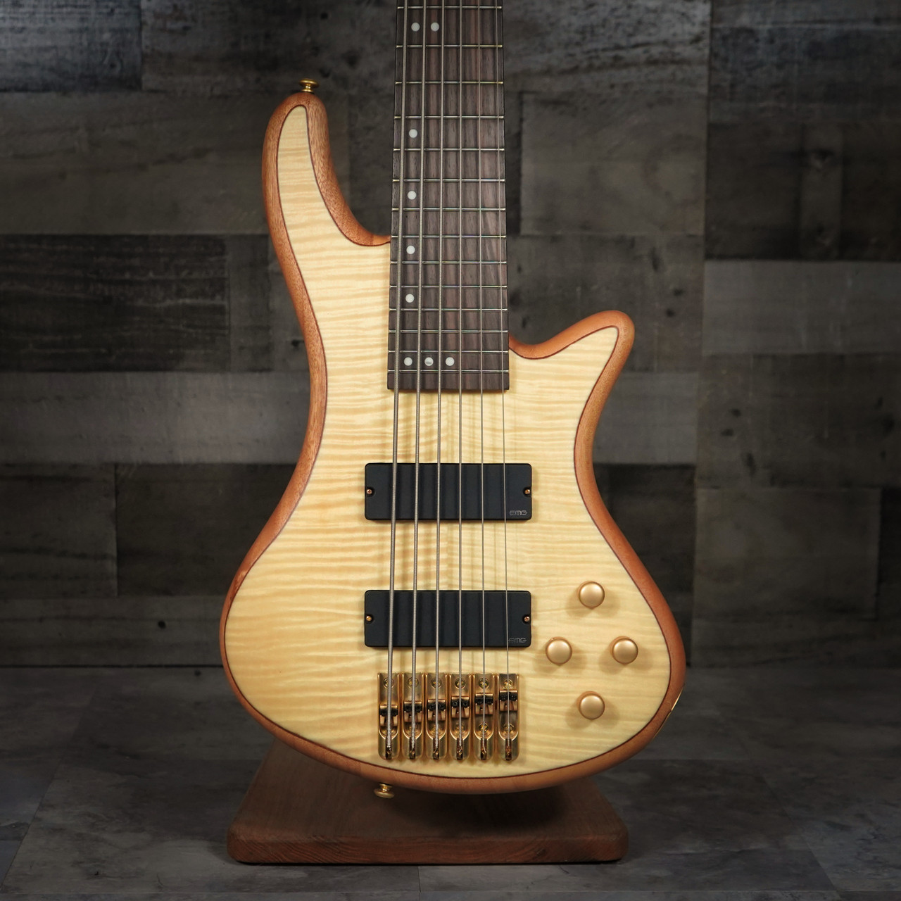 Schecter Stiletto Custom-6 Bass Guitar â€“ Natural Satin (NAT) finish featuring 6-string design, EMG pickups, active 3-band EQ, and contoured mahogany body for smooth, powerful tone and modern versatility