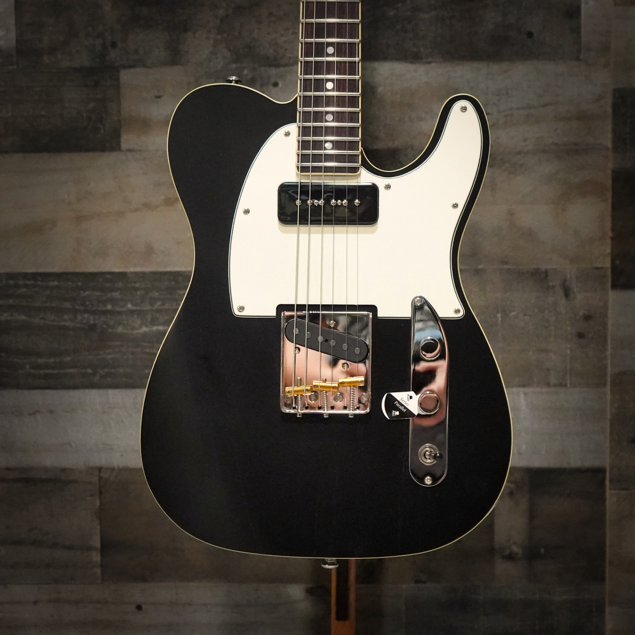 Schecter PT Special Electric Guitar - Black Pearl finish with classic single-cut body, dual pickups, and sleek neck offering vintage tone and modern playability