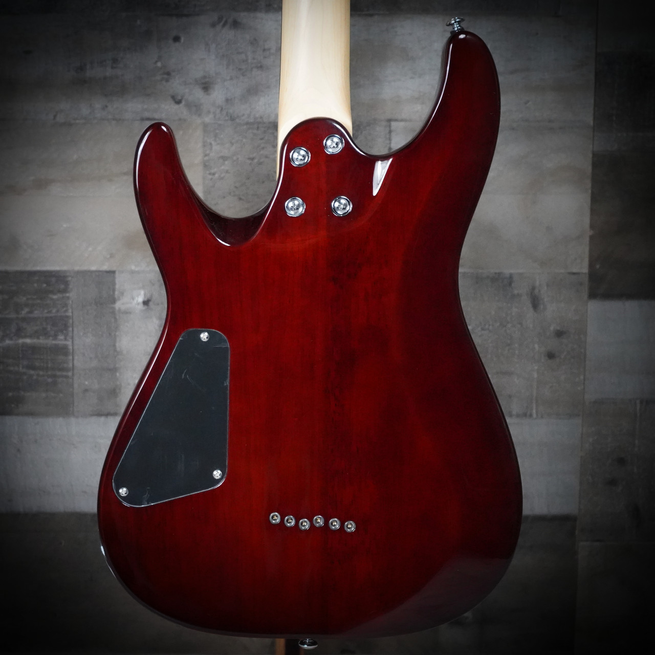 The Schecter C-6 Plus in Vintage Sunburst (444) offers classic styling with its quilted maple top and warm burst finish. Equipped with high-output humbuckers and a smooth thin-C neck, it delivers powerful tone and comfortable playability for rock, metal, blues, and everyday practice. A great choice for players seeking Schecter quality at an accessible price.