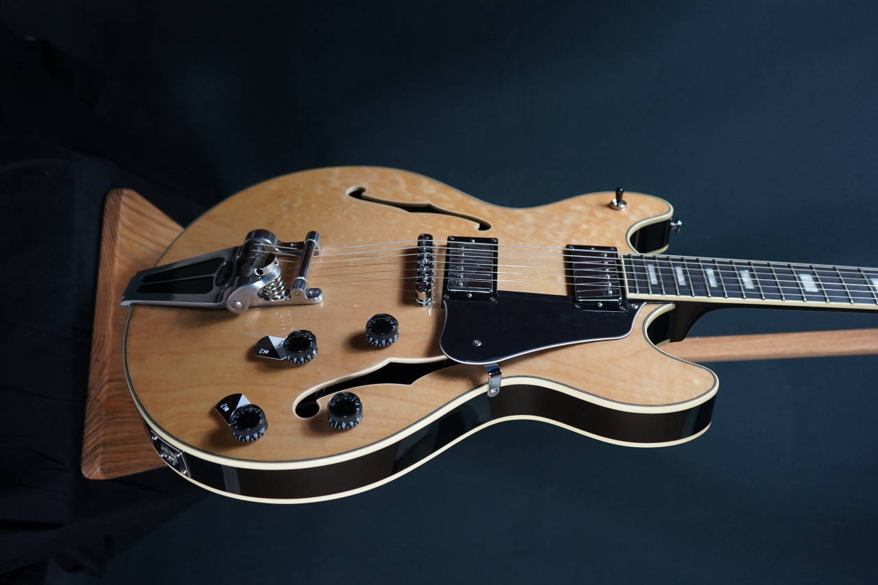 Shop the Schecter Corsair Electric Guitar in Gloss Natural (1553) at Musician Madness. Vintage-inspired tone, semi-hollow warmth, fast shipping.