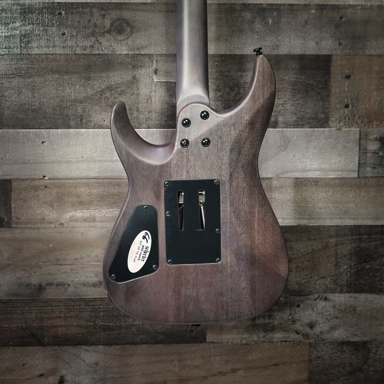 Schecter Omen Elite-6 FR Electric Guitar - Ocean Blue Burst featuring quilted maple top, Floyd Rose tremolo, Schecter Diamond pickups, and sleek black hardware for modern tone and style