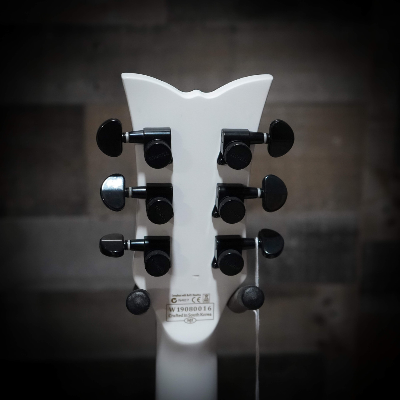 Schecter Jerry Horton Tempest Guitar - Satin White (B-Stock) featuring dual humbuckers, contoured mahogany body, set neck, and sleek satin white finish with artist-level tone and playability