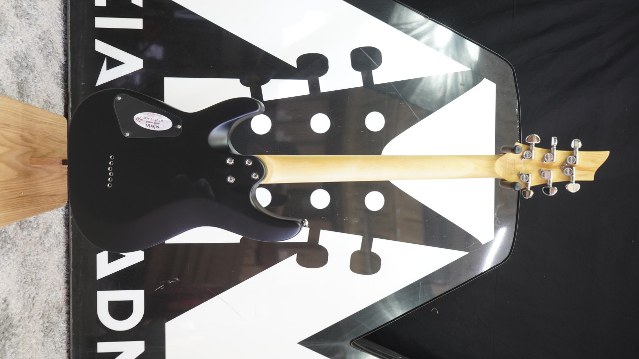 Schecter C-6 Deluxe Electric Guitar - Satin Black (B-Stock) featuring sleek satin finish, dual humbuckers, lightweight basswood body, and fast maple neck for versatile modern tone