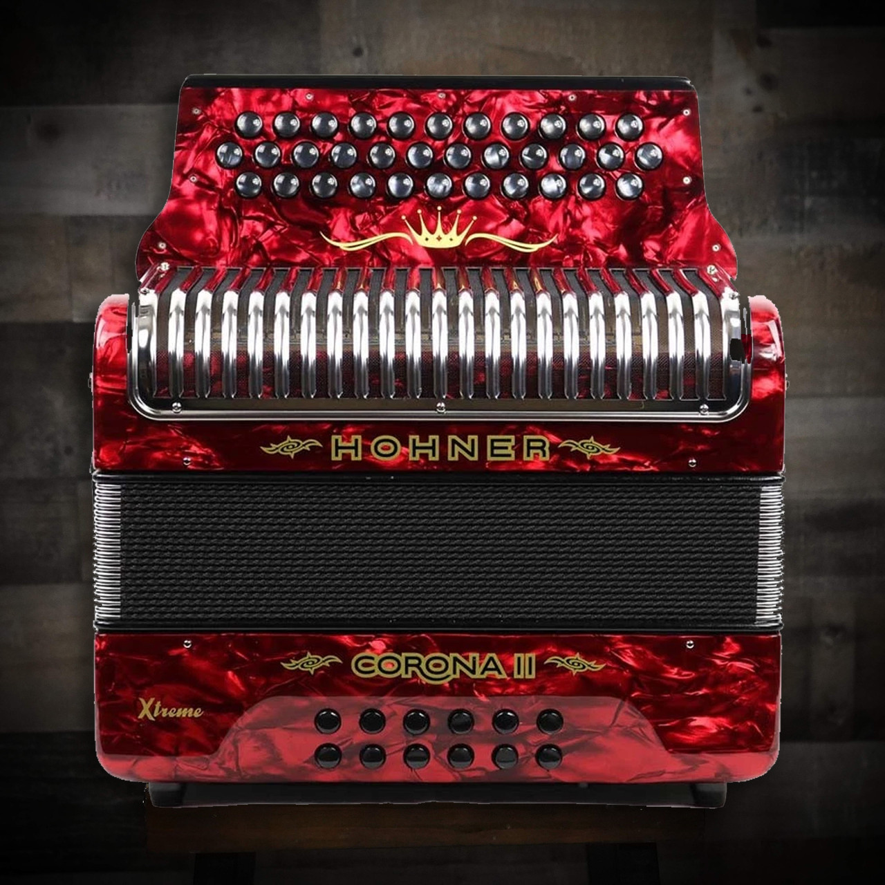 The Hohner Corona II XTREME FBbEb diatonic accordion in pearl red (CXFR) delivers powerful projection and fast response, ideal for norteÃ±o and conjunto styles. Available at Musician Madness.
