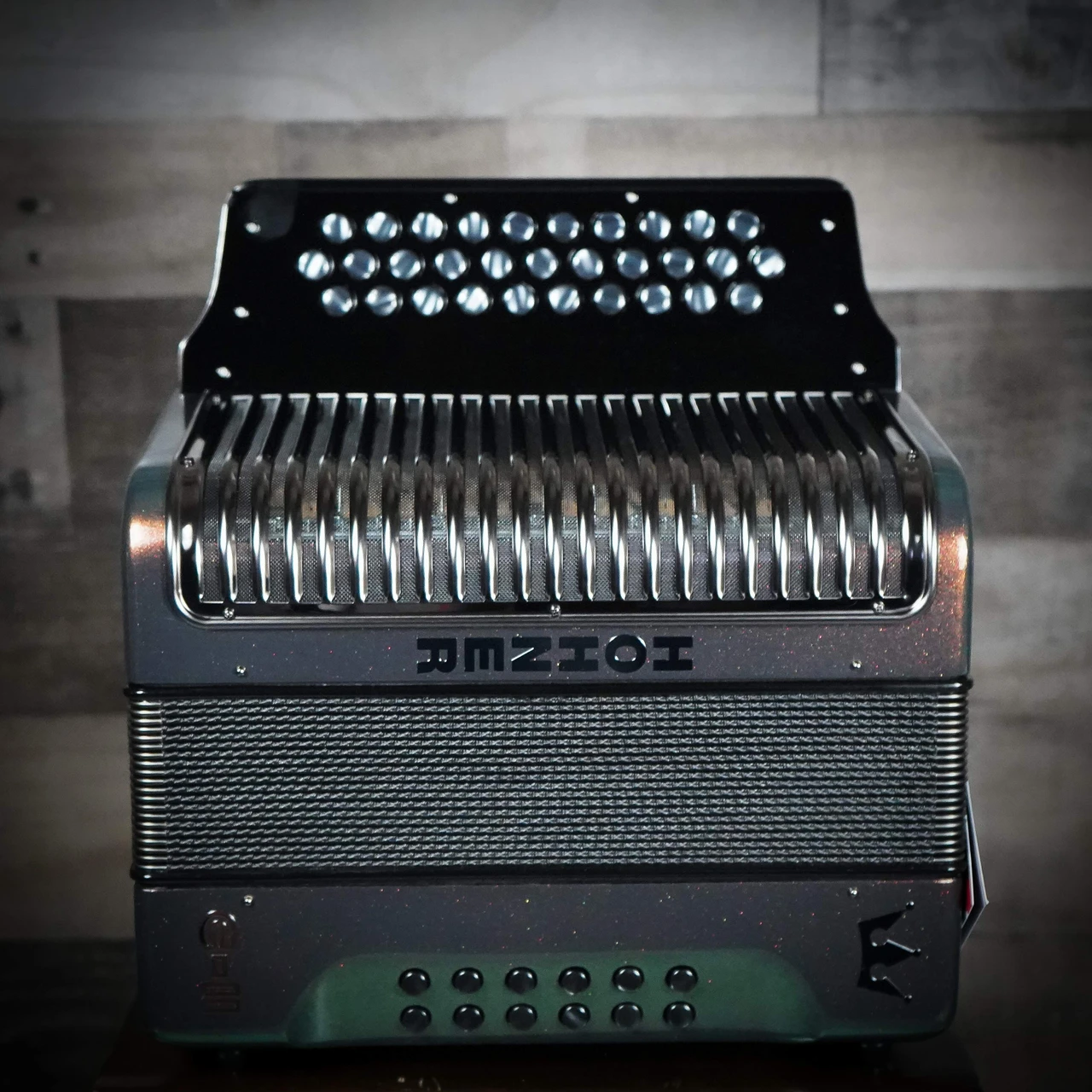 The Hohner Corona C-II Accordion delivers iconic tone and style. FBbEb key, Green-to-Gold finish, durable designÃ¢â‚¬â€perfect for NorteÃƒÂ±o, Tex-Mex & more.