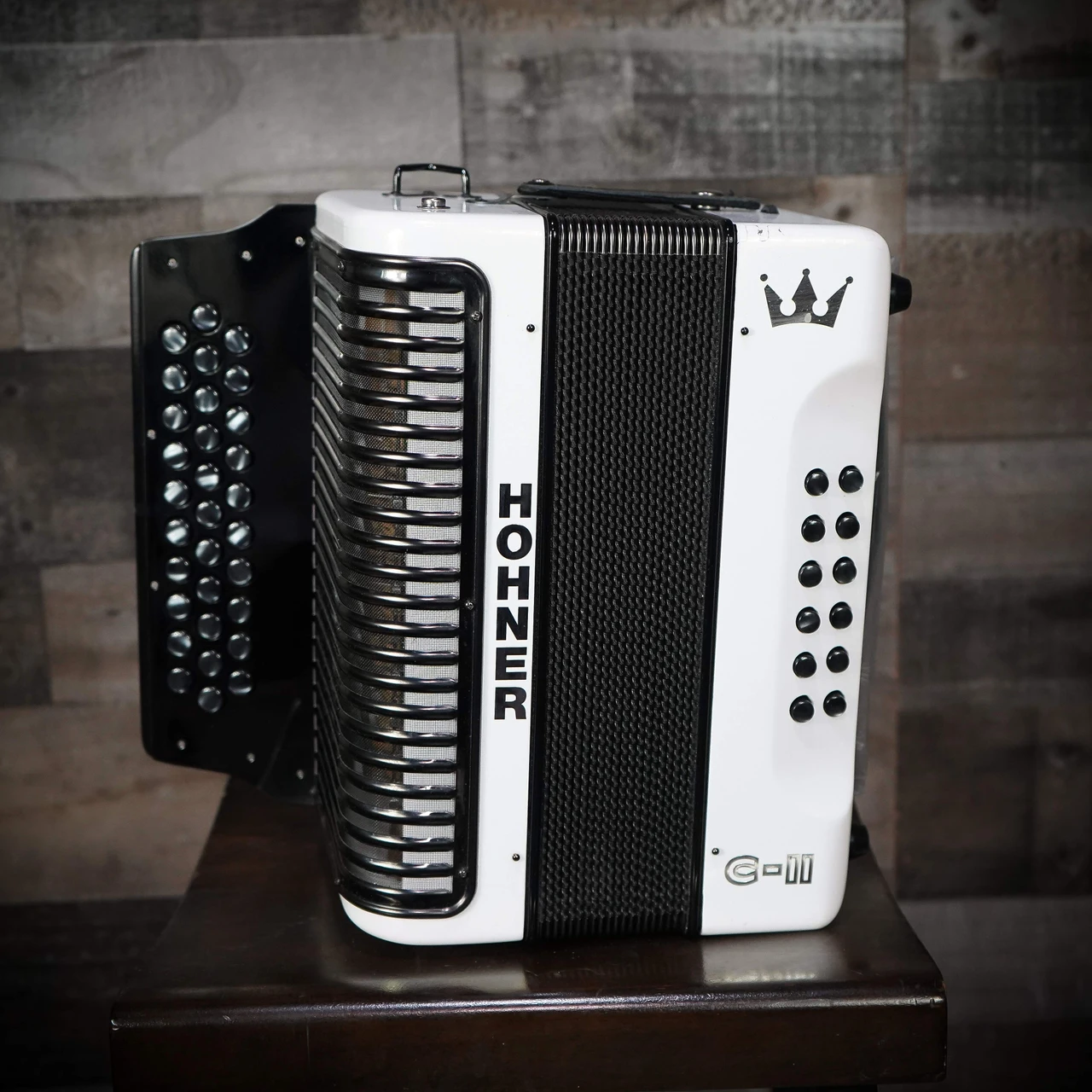 The Hohner Corona C-II FBbEb White Rainbow Accordion delivers radiant style and rich tone. Perfect for Tex-Mex, NorteÃƒÂ±o, and Cumbia players seeking premium sound.