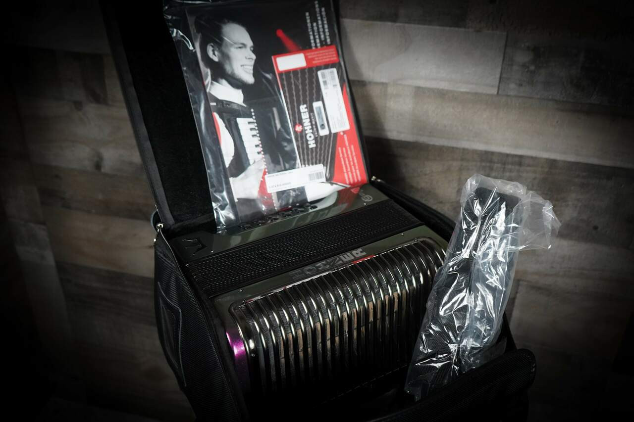 The Hohner Corona C-II FBbEb diatonic accordion in Red to Gold (RTG) delivers classic Hohner tone and fast response, ideal for norteÃƒÂ±o and conjunto styles. Available at Musician Madness.