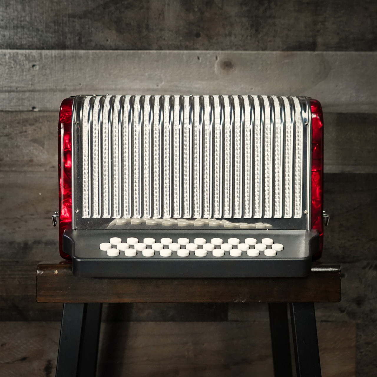 The Hohner Corona II FBbEb Accordion in Pearl Red delivers legendary Hohner tone and style. Perfect for NorteÃƒÂ±o, Vallenato, and Tex-Mex performers.
