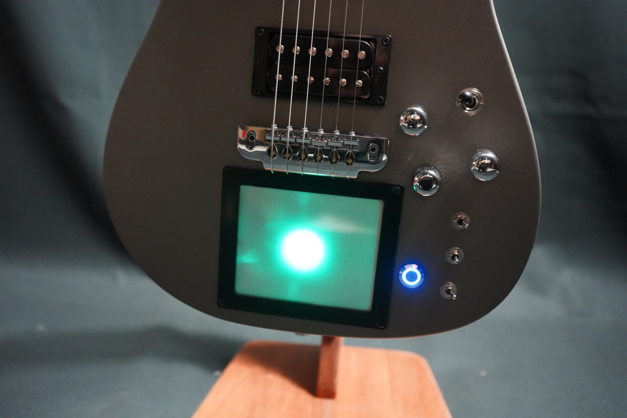 Cort/Manson Custom MBM-1 Matthew Bellamy Signature Guitar – Silver Satin finish with integrated XY pad, Sustainiac pickup system, and custom design inspired by Muse’s Matthew Bellamy