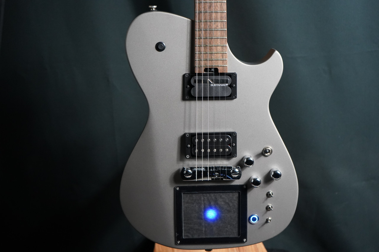 Cort/Manson Custom MBM-1 Matthew Bellamy Signature Guitar – Silver Satin finish with integrated XY pad, Sustainiac pickup system, and custom design inspired by Muse’s Matthew Bellamy