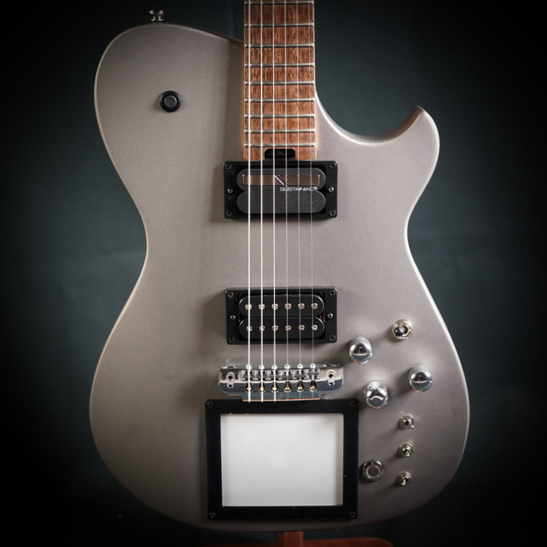Cort/Manson Custom MBM-1 Matthew Bellamy Signature Guitar – Silver Satin finish with integrated XY pad, Sustainiac pickup system, and custom design inspired by Muse’s Matthew Bellamy
