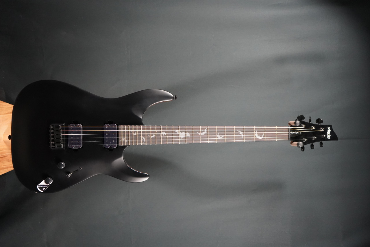 Schecter Damien 6 Platinum Electric Guitar in Black finish - B-Stock model featuring EMG pickups, gothic cross inlays, and sleek contoured double-cutaway body