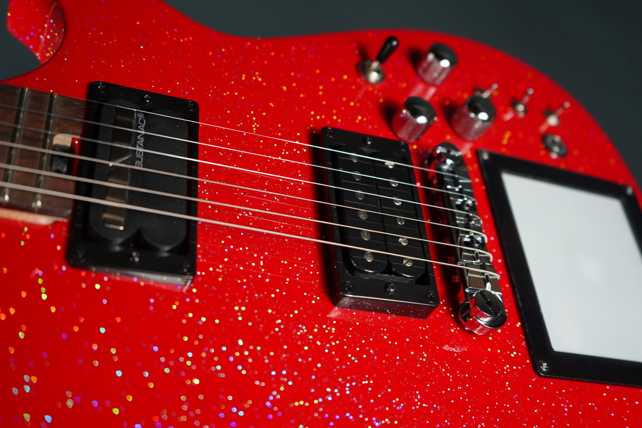 Cort Manson MBM-1 Electric Guitar in Red Santa finish â€“ signature model featuring integrated Kaoss Pad, Sustainiac pickup system, and ergonomic modern body design