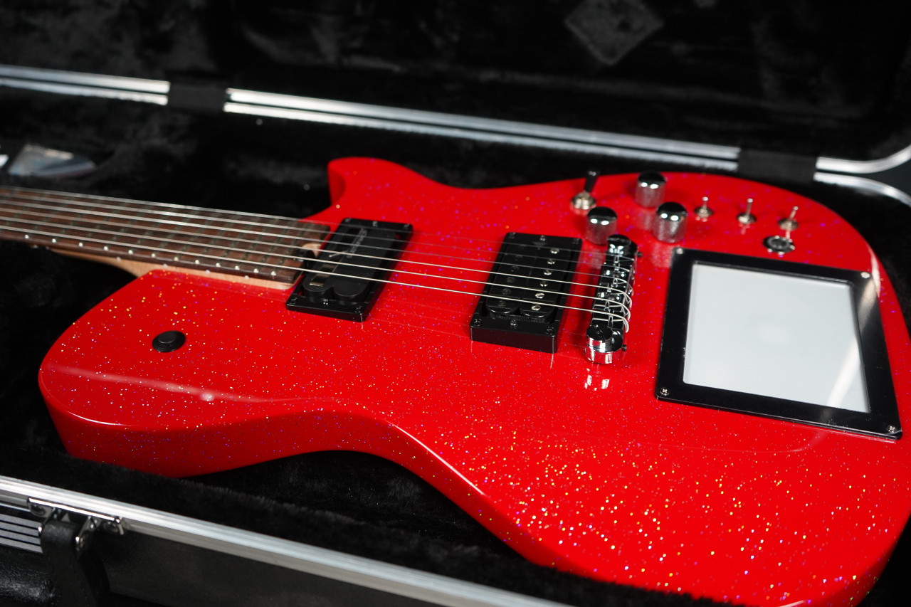 Cort Manson MBM-1 Electric Guitar in Red Santa finish â€“ signature model featuring integrated Kaoss Pad, Sustainiac pickup system, and ergonomic modern body design
